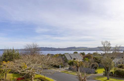 Waipahihi House | Harvey Lake House - stylish comfort with outdoor deck and lake views