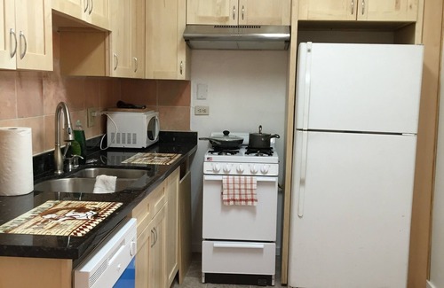 Sunnyside Apartment | Has a huge deck, BBQ,Table,Chairs