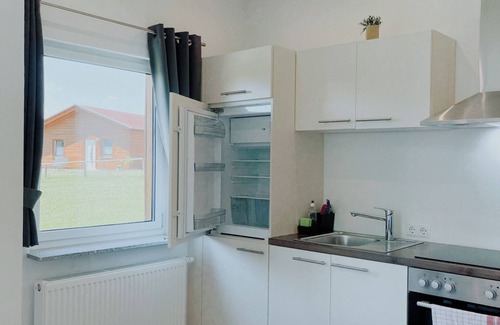 Lahnstein auf der Hohe House | Haus Rheinblick - A house surrounded by greenery.