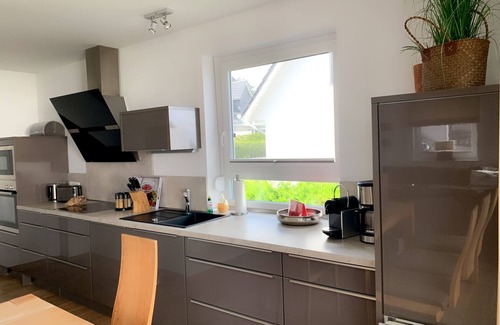 Muritz House | Haus Seeblick Comfort mit Kamin, Außen-whirlpool, Sauna und Eingezäunten Garten