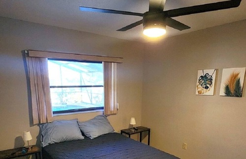 Pebble Beach House | !HEATED POOL/LANAI-BBQCANAL WATERFRONT-NEAR BEACH/GOLF/PARK/TENNIS/RESTAURANTS!