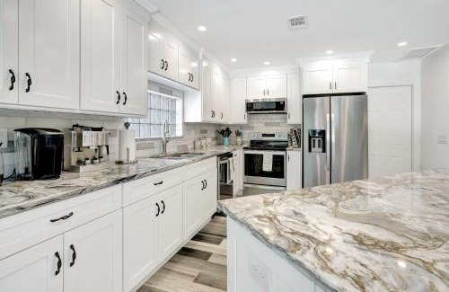Bonita Springs House | Heated Pool & Spa Home on a Scenic, Gulf Access Canal -Close to Bonita Beach!