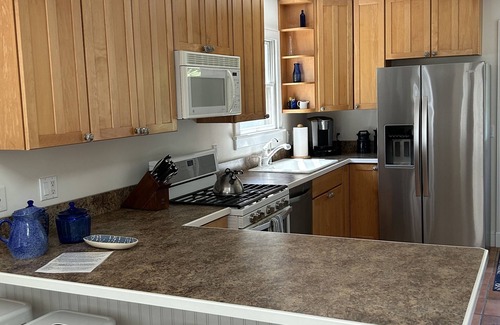 Clearwater Beach House | Heated SaltWater Pool, Walk to Beach, Private Yard for Pup, Spotless easy home.