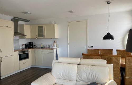 Buitenpost Apartment | Heerlijk hoek appartement net buiten het dorp