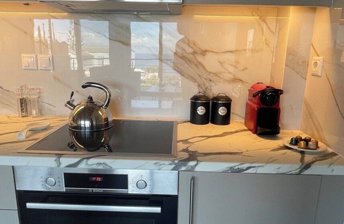 Kefalari Apartment | Hellenic Escapes: Modern 2-Bedroom with Panoramic Sea Views