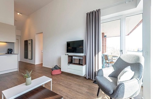 Langeoog Apartment | Helles Familienapartment in Strandnähe mit Sonniger Loggia und Sauna im Haus!