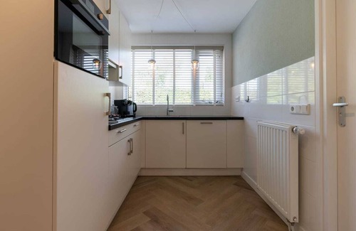 Groot Valkenisse House | Hello Zeeland - Vakantiewoning Beach Lodge Zilt