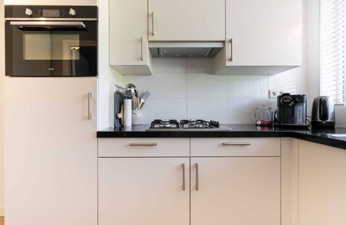 Groot Valkenisse House | Hello Zeeland - Vakantiewoning Beach Lodge Zilt