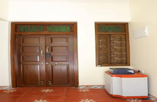 Madurai House | Heritage home with 2 bed/2 bath with kitchen in a residential neighborhood.
