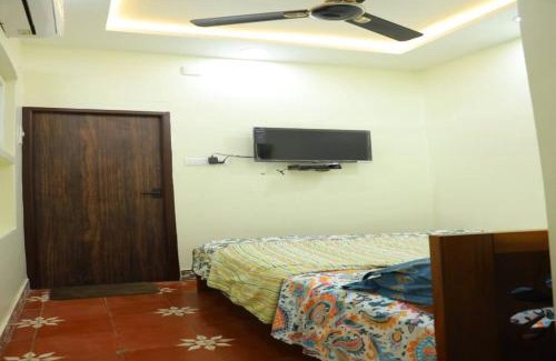 Madurai House | Heritage home with 2 bed/2 bath with kitchen in a residential neighborhood.