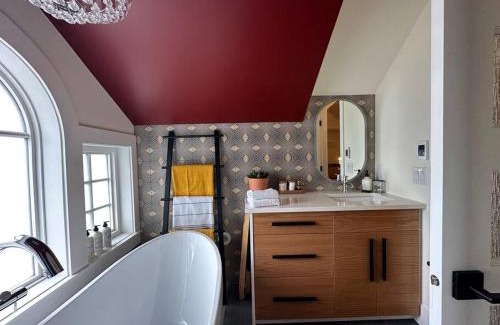 Northeast Edmonton House | Heritage-Inspired Guesthouse - Luxe Bath & Elegant Ceilings