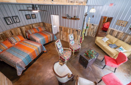 Mount Sterling Bed & Breakfast | Hermann Grain Bins BNB and Retreat Center Guest Grain Bin Foghorn Leghorn is a 2 story 30 plus foot grain bin with two distinct levels. Main level contains two queen beds, living room and full bathroom. Balcony Level contains queen bunk bed and ful