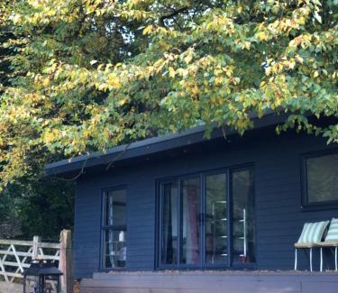 Hertford House | Hertford farm Woodland cabin pet friendly firepit bbq