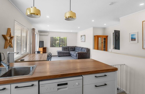 Hatfields Beach House | Hibiscus Hideaway - Orewa Beach Holiday Home