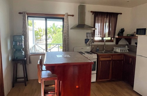 Caye Caulker Cottage | Hidden Treasure Vacation Home Bayblue Cottage Breathtaking view beautiful sunset