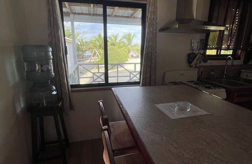 Caye Caulker Cottage | Hidden Treasure Vacation Home Bayblue Cottage Breathtaking view beautiful sunset