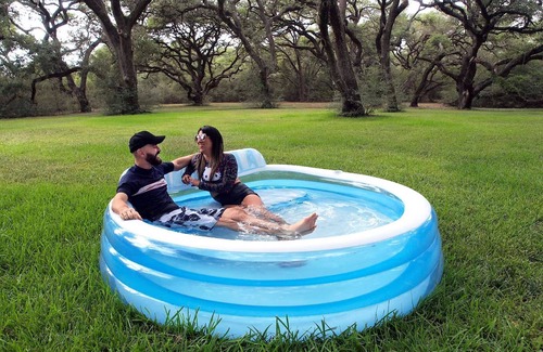 Cat Spring Cabin | Hideaway Cabin secluded & nestled in the live oaks with private outdoor Hot Tub!