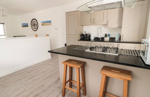 Craster Cottage | HIGH TIDE HOUSE, pet friendly, with a garden in Craster
