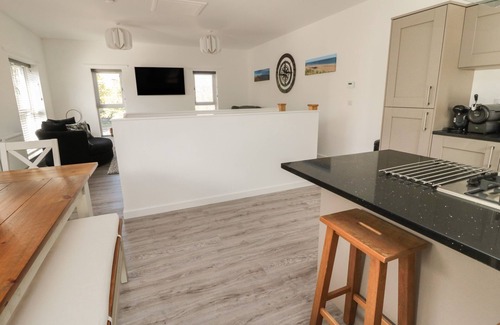 Craster Cottage | HIGH TIDE HOUSE, pet friendly, with a garden in Craster