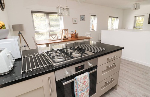 Craster Cottage | HIGH TIDE HOUSE, pet friendly, with a garden in Craster
