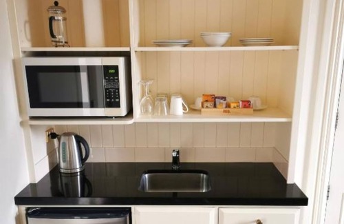 North Dunedin Hotel | Highland House Boutique Hotel