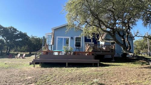 Oatmeal House | Hill Country Highland's Bluebonnet Cottage