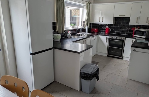Hillsborough House | Hillsborough spacious house, garden & parking by StayByNumbers