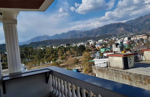 Bullawala Apartment | Hillside nest 2 BHK apartment with a hill and mussoorie view.
