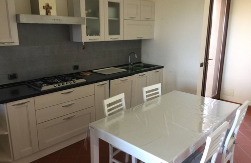 Tavullia House | Hillside villa with sea view