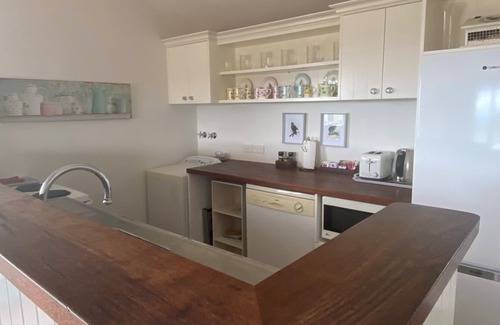 Waiotahi Cottage | Hilltop Cottage in Ohiwa with beautiful range and beach views
