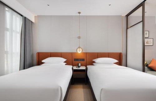 Xingyi Hotel | Hilton Garden Inn Xingyi Orange Hill Plaza