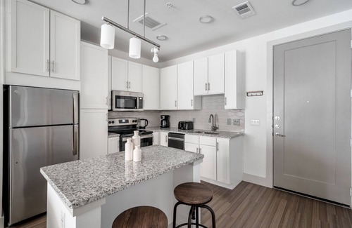 Waller Creek District Apartment | Hip Downtown 1BR w/Deck & Gym, nr Shopping & Food, by Blueground