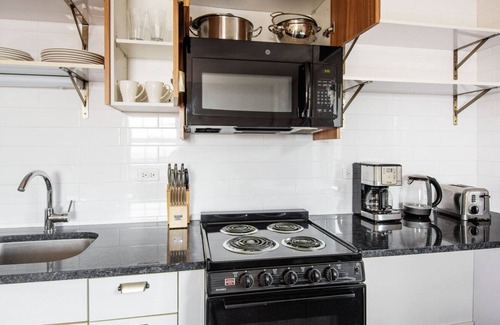 Uptown Apartment | Hip Uptown 1BR w/ Rooftop & Grills, nr Hospital & Beach, by Blueground
