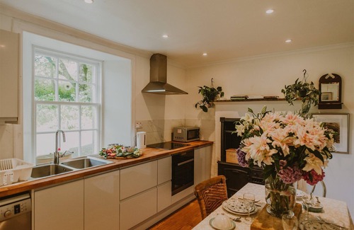 Stranraer Cottage | Historic Arcadia: Heritage Coachman Lodge on 2000-acre Seaside Estate
