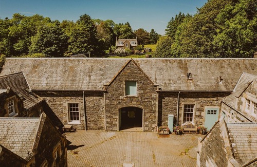 Stranraer Cottage | Historic Arcadia: Heritage Coachman Lodge on 2000-acre Seaside Estate
