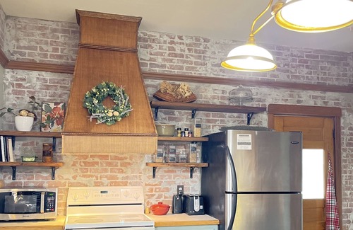 Salina Cottage | Historic charm, college proximity, and local flavor – your cozy, retreat awaits!