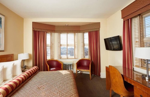 Gayborhood Hotel | Historic Charm in Boutique Hotel Room – Free Breakfast