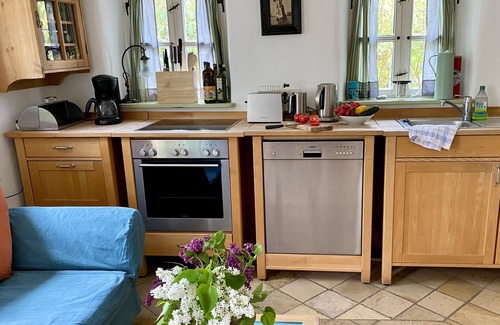 Furstenfeldbruck District House | Historic Cottage next to a natural swimming pond and a magnificent fruit garden