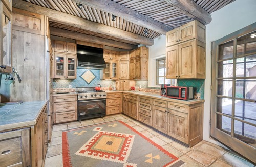 Taos House | Historic dog-friendly hacienda with 2 casitas, fireplaces, on-site hot tub, yoga