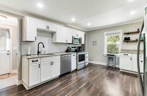Southport Cottage | Historic dog-friendly renovated cottage with streaming, patio, W/D, & AC