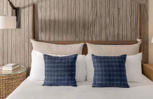 Goat Island Hotel | Historic Downtown Retreat | Resort with Scenic Water View | Outdoor Pool