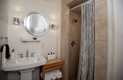 Bywater Bed & Breakfast | Historic Firehouse in the French Quarter! Queen suite with private bathroom.