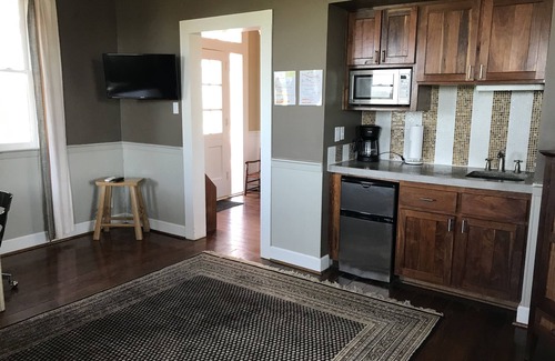Hempstead House | Historic Hip Remodel "Little Red School House"