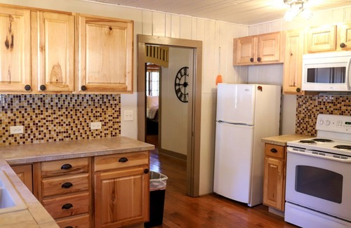 Rapid City Cabin | Historic Log Cabin for South Dakota Glamping Getaways