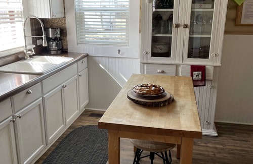 Buffalo House | Historic Log Cabin home on Main Street