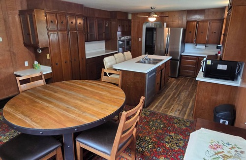 Cowley House | Historic Log Home in Beautiful Cowley