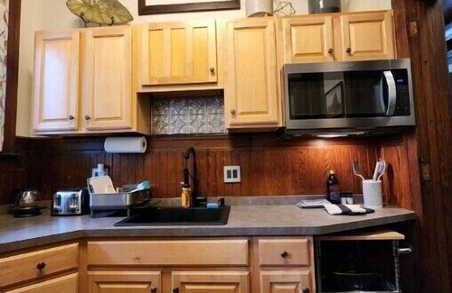 Springville Apartment | Historic Springville Train Station 2-Bedroom Hotel Apartment With Private Patio