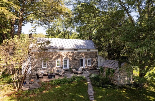 Accord House | Historic stone house & barn on 10 acres with patio, fireplace, & antique charm