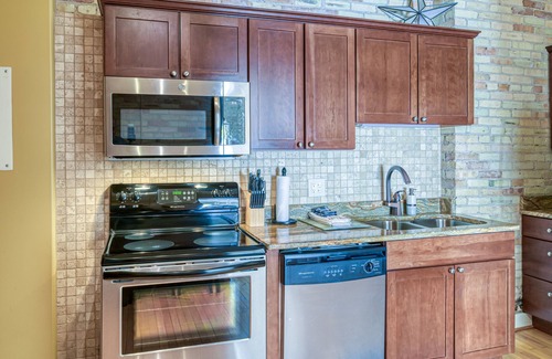Traverse City Condo | Historic Top Floor Condo at the Grand Traverse Commons