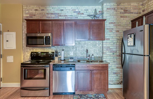 Traverse City Condo | Historic Top Floor Condo at the Grand Traverse Commons
